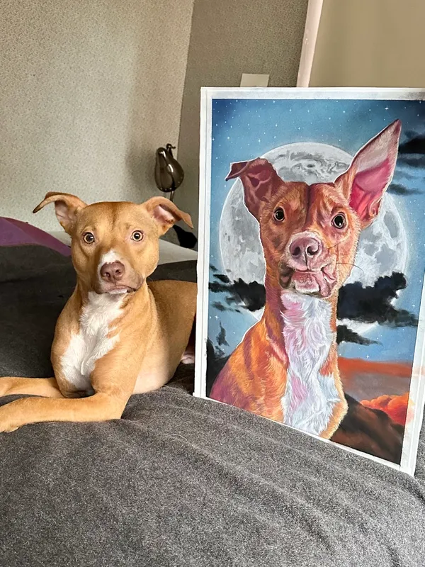 Portrait next to the actual dog, looking vacant