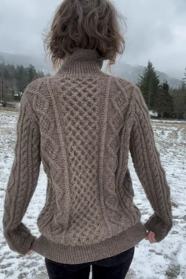 Back of sweater showing honeycomb cable panel