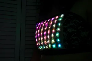 crop top with textured smocking over colorful LEDs