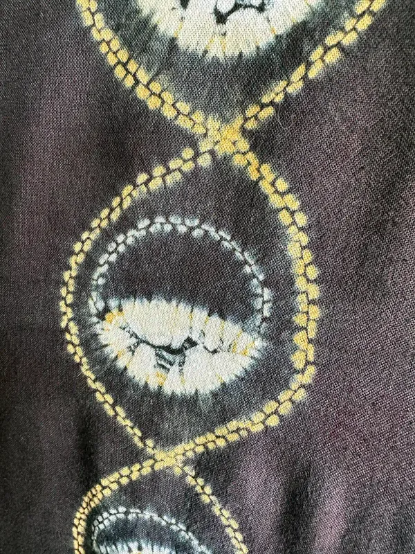 Detail of lunar cycle, a crescent crescent moon surrounded by yellow arcs