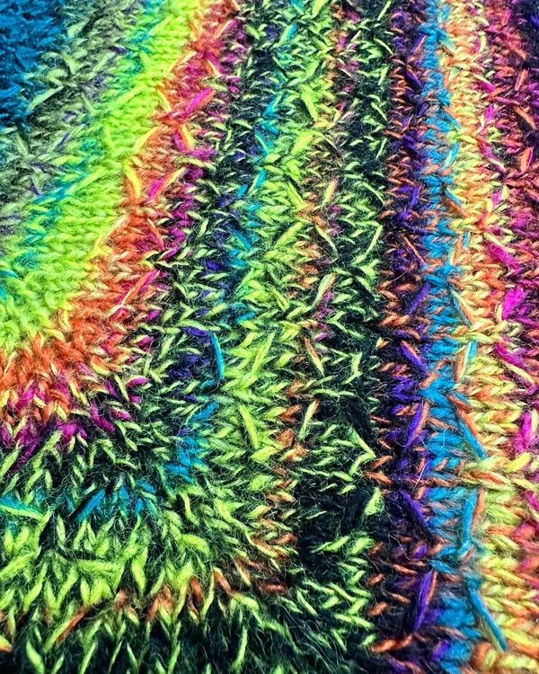 detail of knitting, with drop stitch pattern
