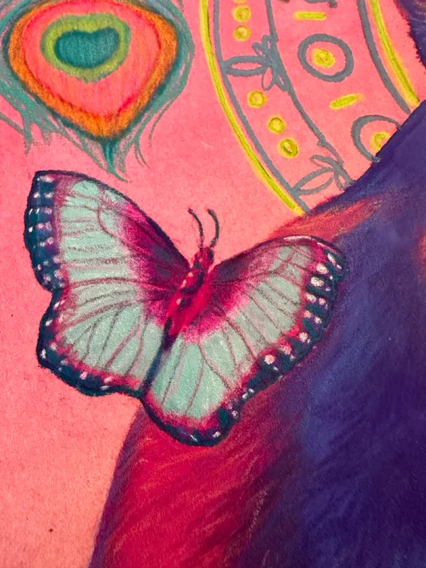 detail of a butterfly on the cat's back