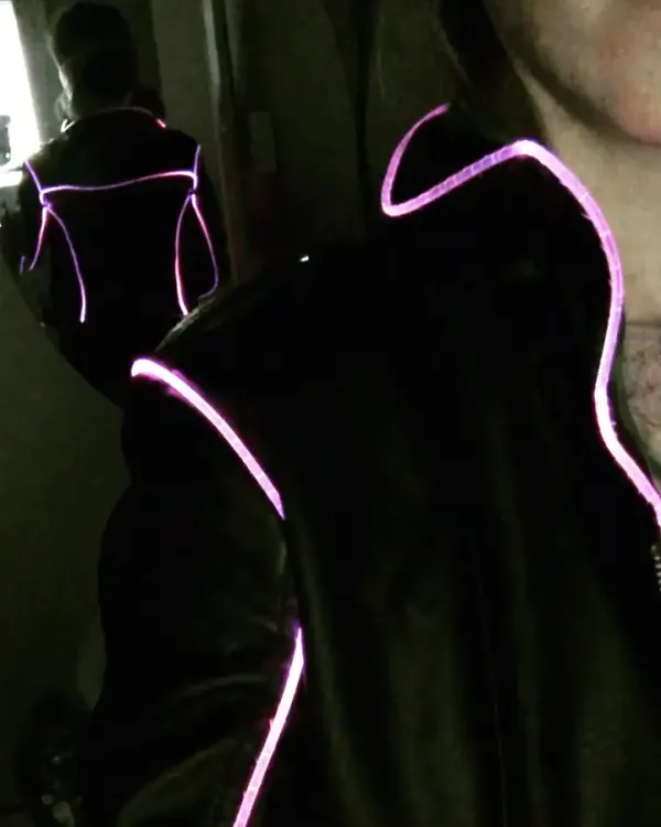 Pleather jacket with fiber optic lines around the seams