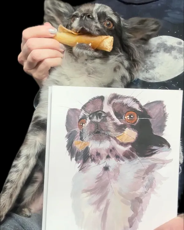 painting next to the actual dog, holding the swizz