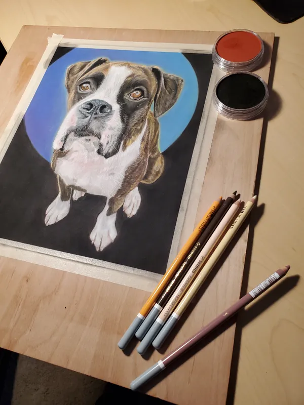 full view of the painting in progress, with pastel pencils nearby